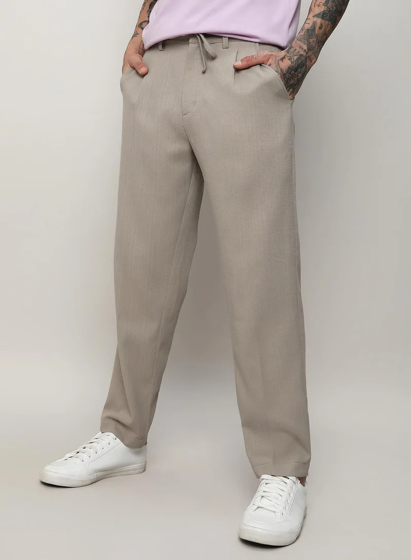 Campus Sutra Campus Sutra Men’s Oatmeal Beige Solid Tailored Trousers – Regular Fit, 4 Pockets, Drawstring Closure