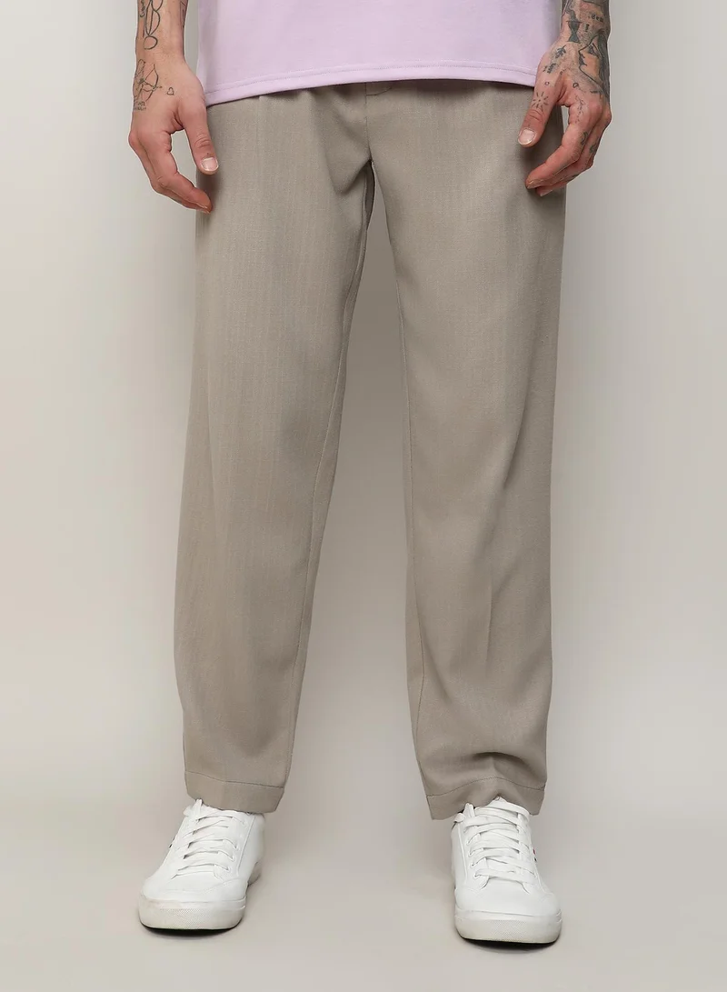 Campus Sutra Campus Sutra Men’s Oatmeal Beige Solid Tailored Trousers – Regular Fit, 4 Pockets, Drawstring Closure