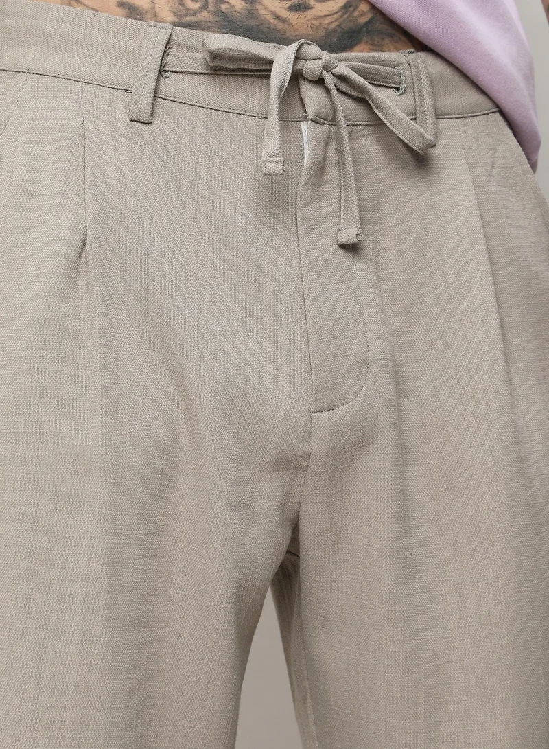Campus Sutra Beige Men's Oatmeal Beige Solid Tailored Trousers for Men | Best Price UAE