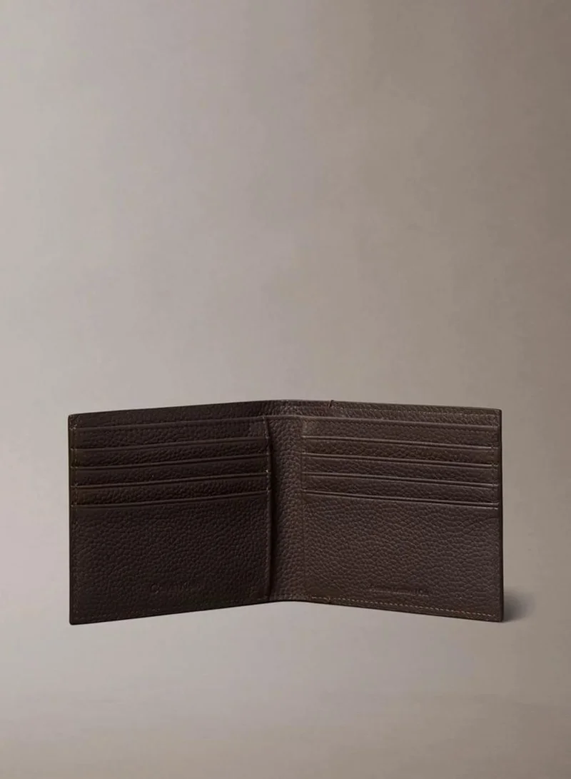 Calvin Klein CK Dark Brown Foil Embossed Logo Bifold Wallet for Men | Best Price UAE