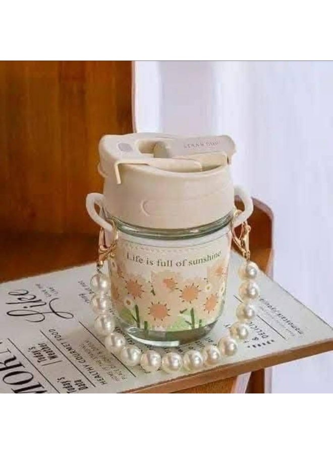 Mug with straw, leather cover, and pearl handle - Image 1