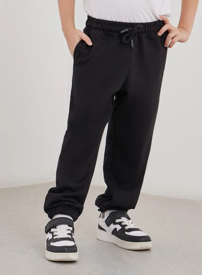 ستايلي Styli Black Cotton Cuffed Joggers with Pockets