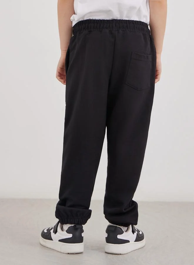 Styli Styli School Uniform Black Cotton Cuffed Joggers with Pockets