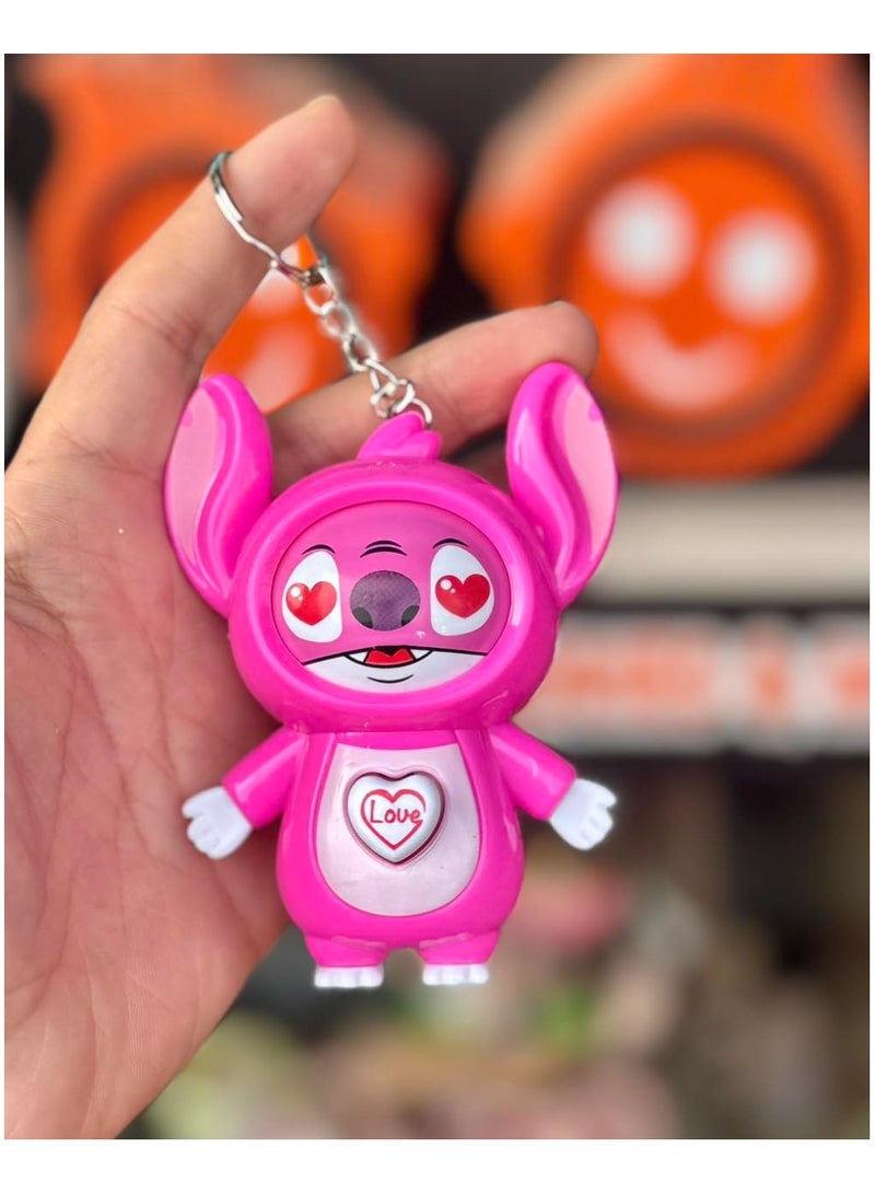 (2 pieces) Stitch Character Keychain - Face-Change Emoji Doll - Stress Relief Toy  The surprise keychain changes its face with the press of a button. Add a touch of fun to your keys or bag with this adorable interactive Stitch keychain. Perfect for keys or a bag decoration - a fun gift for kids and adults.  - Image 4