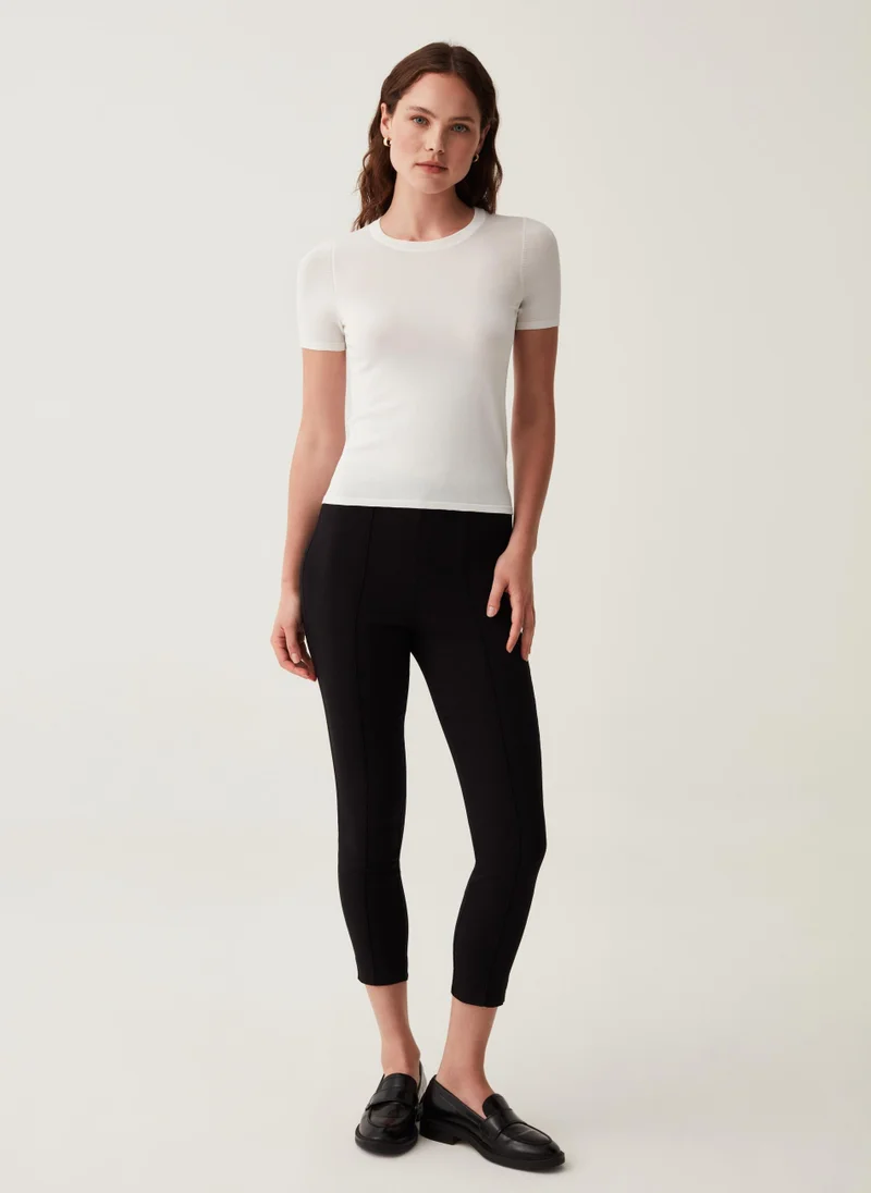 او في اس Cropped stretch leggings