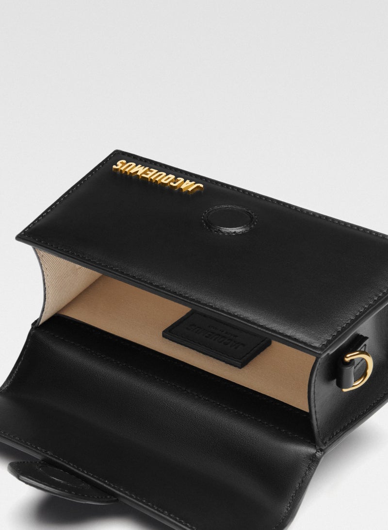 Jacquemus  حقيبة جاكيموس ذا بامبينو ذات غطاء وحزام قابل للفصل، حقيبة يد نسائية، حقيبة كتف نسائية، حقيبة توت نسائية، حقيبة سفر نسائية، أسود لامع - ١٧ سم - Image 5