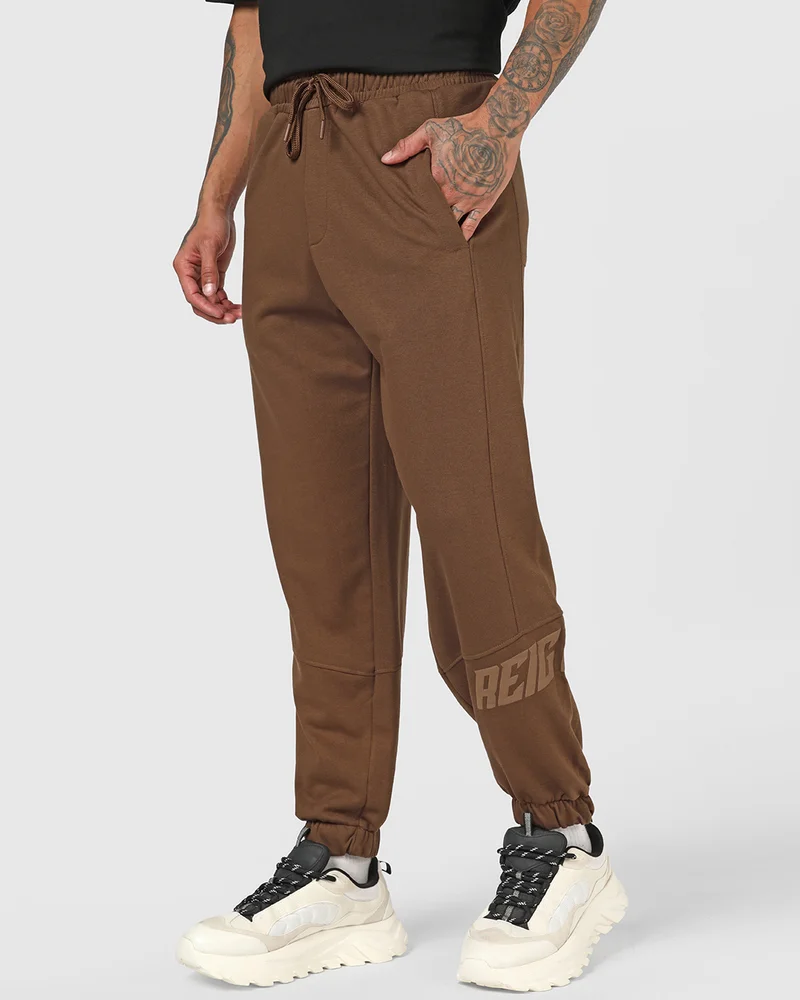 bewakoof Men's Toffee Brown Reignite Typography Oversized Joggers