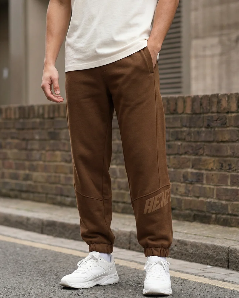 bewakoof Men's Toffee Brown Reignite Typography Oversized Joggers