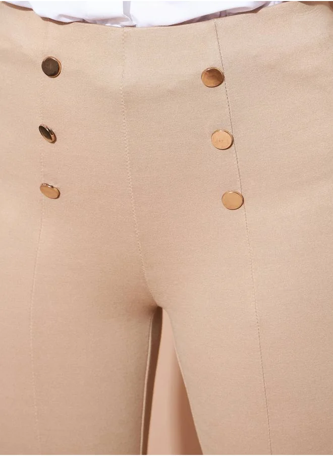 SASSAFRAS High Rise Gold Show Button Detail Flare Pants by Styli