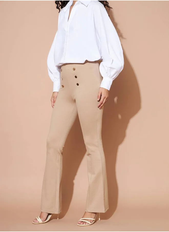 SASSAFRAS High Rise Gold Show Button Detail Flare Pants by Styli