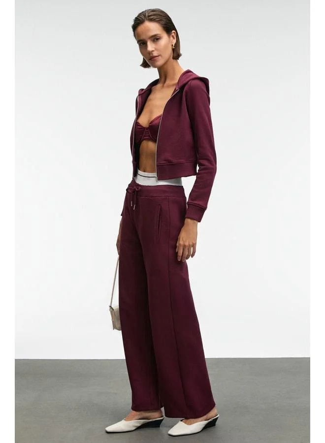 GRIMELANGE TOVELLE Women's waist extra-elastic double-pocket wide-leg burgundy sweatpants.
