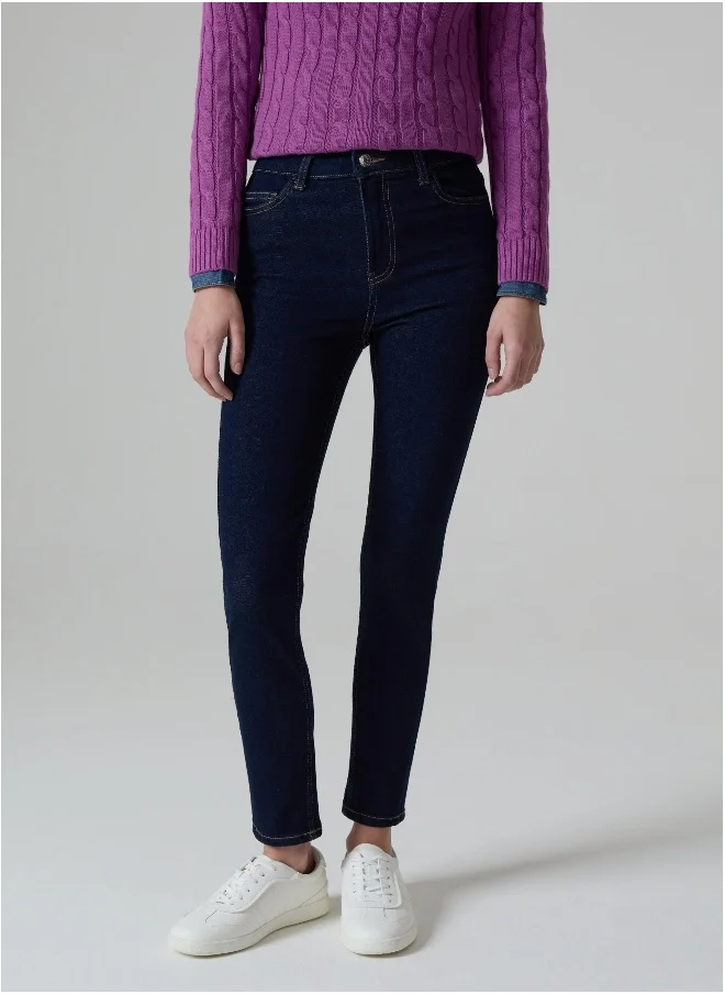 او في اس Skinny-fit stretch jeans