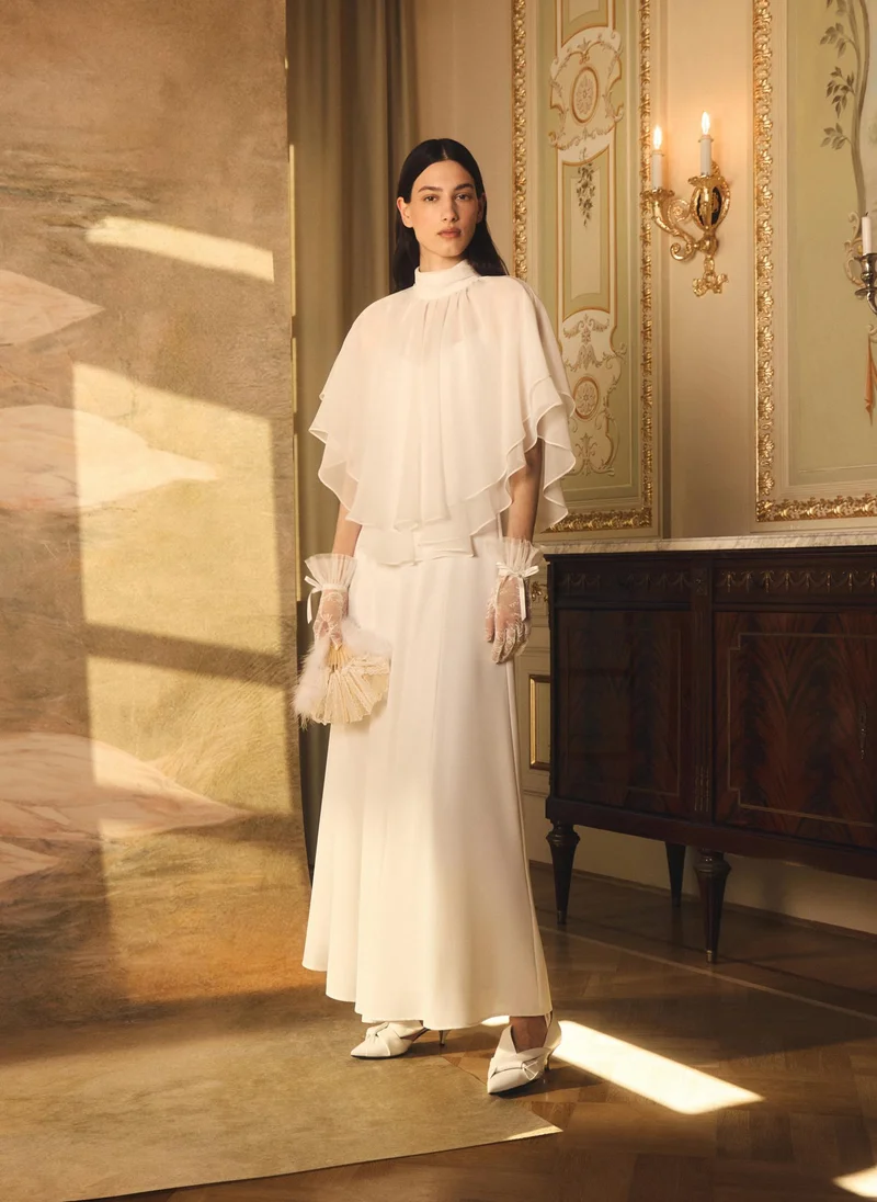 Maxi dress with a layered semi-transparent cape