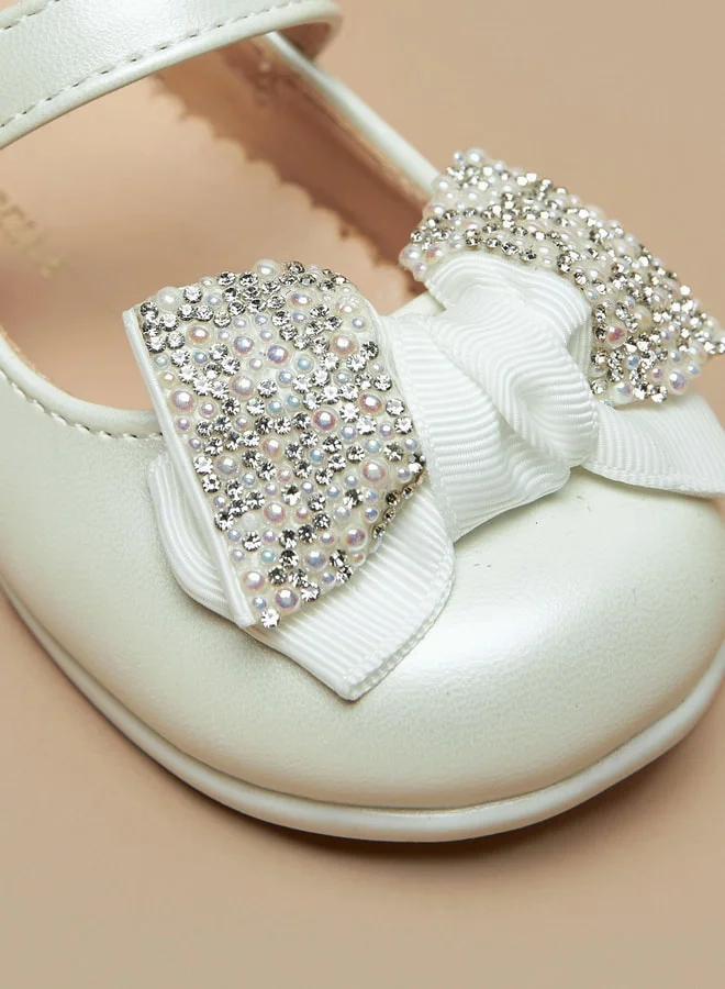 فلورا بيلا من شو إكسبرس Girls Bow Accent Booties With Hook And Loop Closure