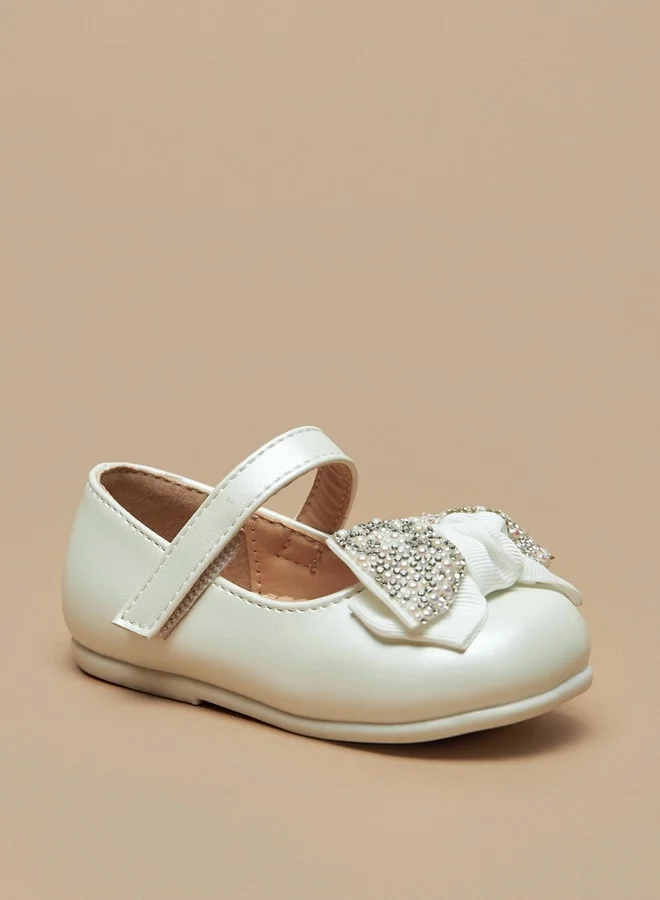 فلورا بيلا من شو إكسبرس Girls Bow Accent Booties With Hook And Loop Closure