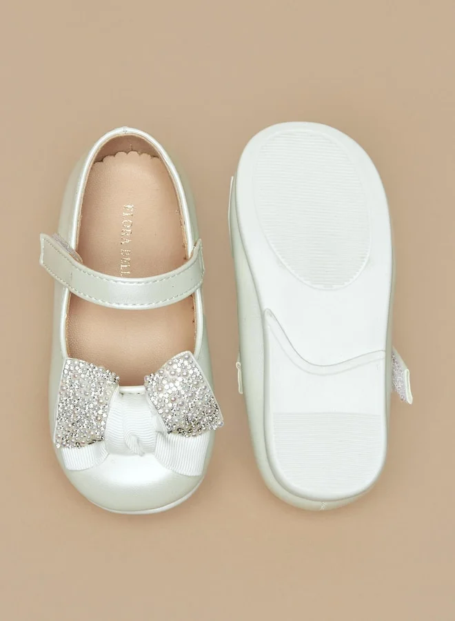 فلورا بيلا من شو إكسبرس Girls Bow Accent Booties With Hook And Loop Closure
