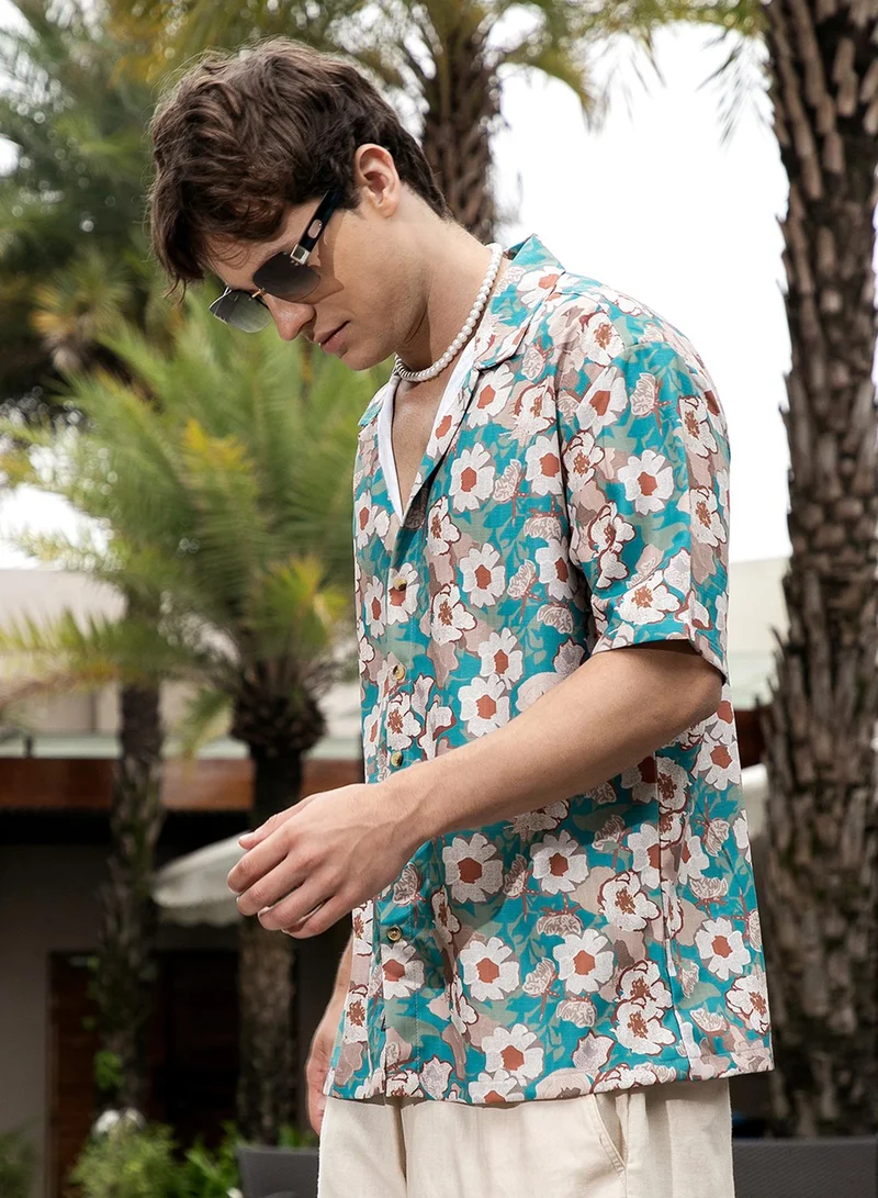 Campus Sutra Campus Sutra Men's Multicolour Flora-Block Oversized Shirt For Casual Wear | Cuban Collar | Short Sleeve | Button Closure | Oversized Shirt Crafted With Comfort Fit For Everyday Wear