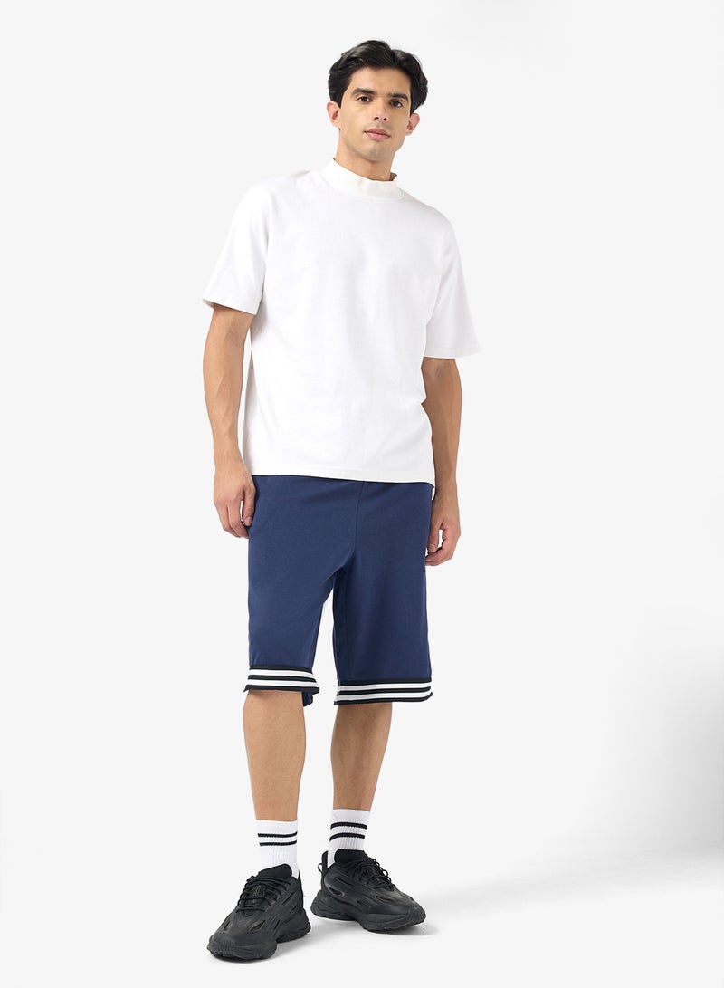 سفنتي فايف شورت مقلم واسع - Image 2