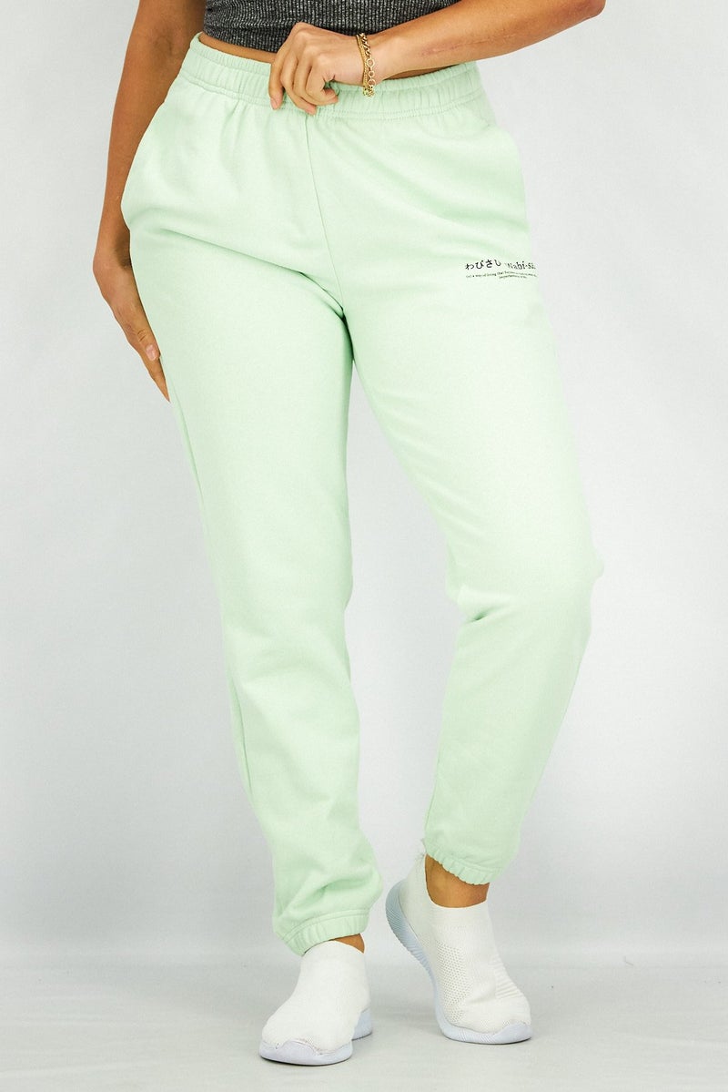 Ocean Pacific Women Sportwear Fit Graphic Print Track Pant, Green - Image 1