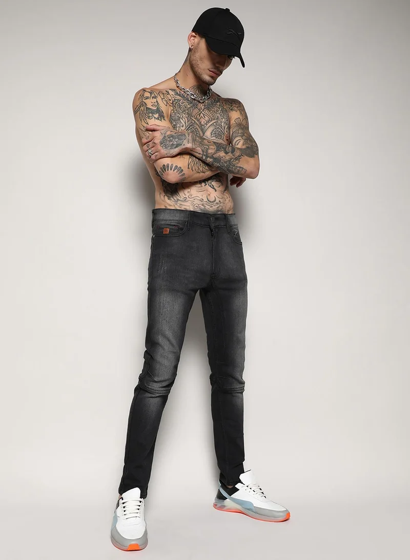 Campus Sutra Campus Sutra Men's Black Self-Design Patched Stitched Denim Jeans For Casual Wear | Medium-Wash | Regular Fit | Button Closure | Cotton Denim Jeans Crafted With Comfort Fit For Everyday Wear