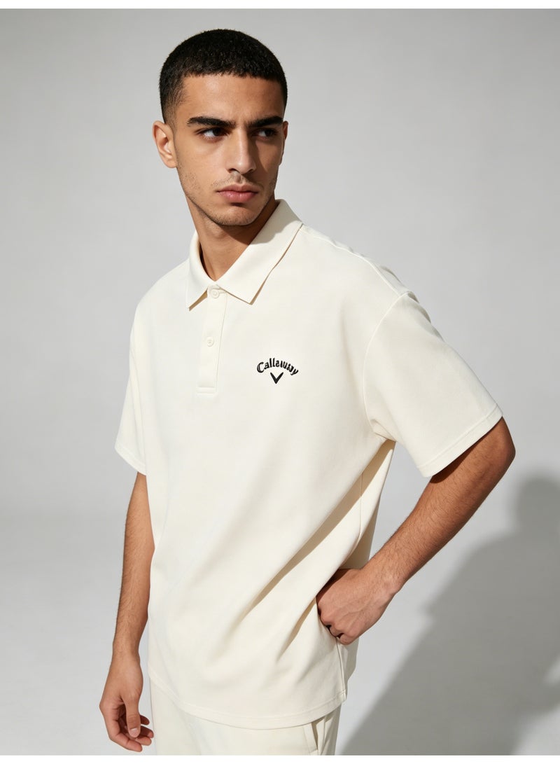 Callaway Men’s Cream Off White Short Sleeve Golf Polo Shirt with Black Printed Chest Logo - Image 5