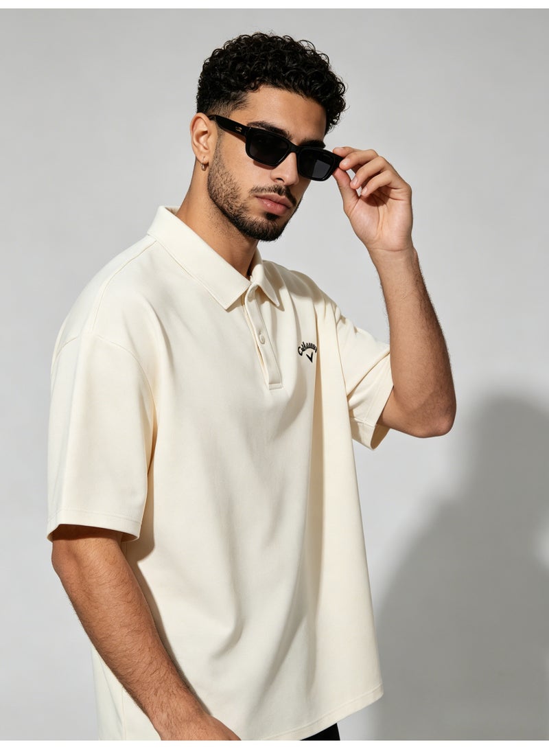 Callaway Men’s Cream Off White Short Sleeve Golf Polo Shirt with Black Printed Chest Logo - Image 3