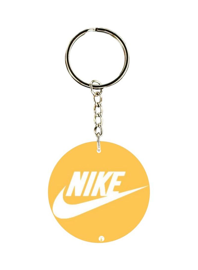 yellow nike keychain
