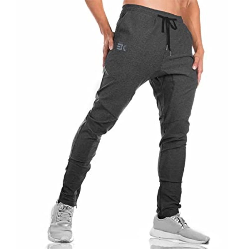 Gym joggers for men, polyester-spandex blend, black, moisture-wicking with secure zipper pockets - Image 1