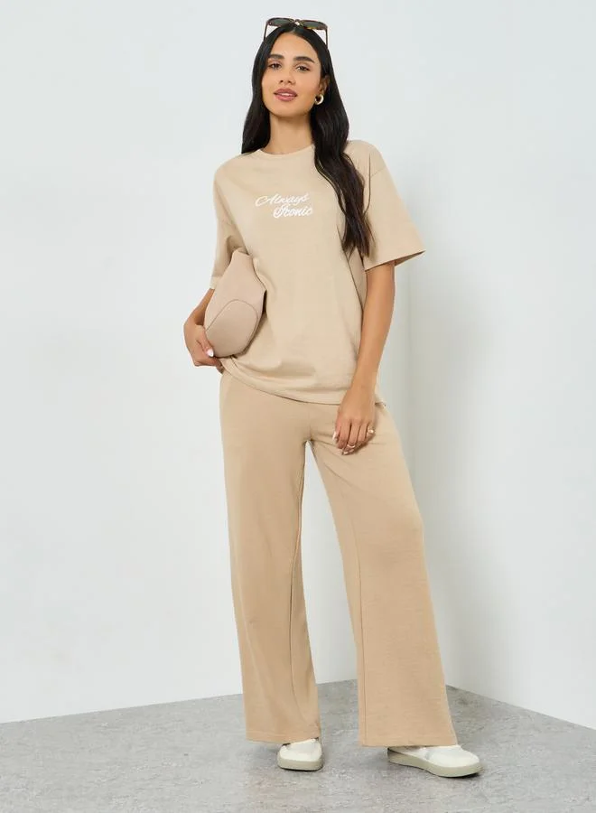 Styli Beige Slogan Print Oversized T-Shirt