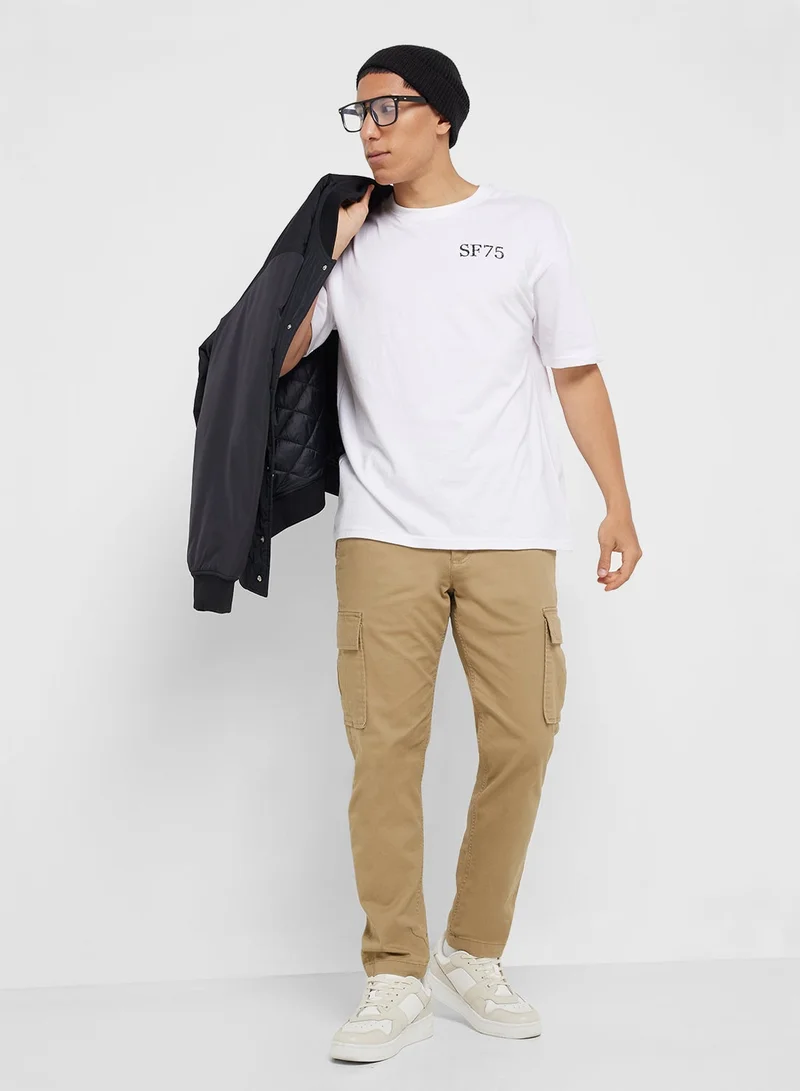 Seventy Five white Graphic Print Oversized T-Shirt for Men | Best Price UAE