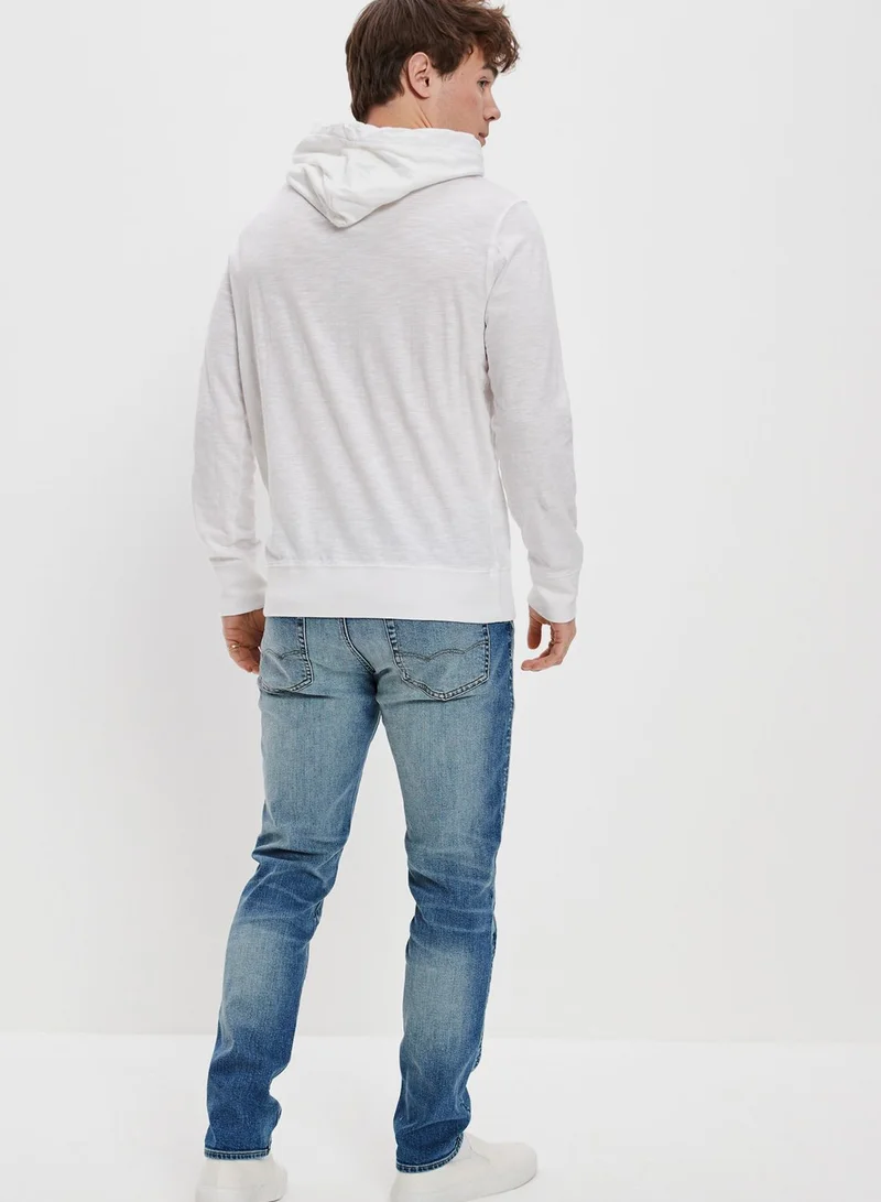 American Eagle Light Wash Athletic Fit Jeans