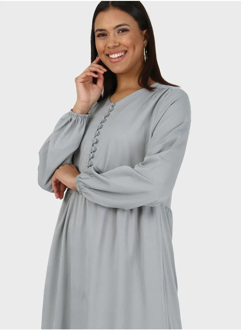 Alia by modanisa Buttoned Neck Ruffled Dress