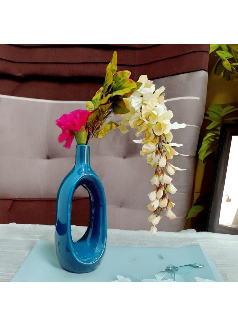 Caffeine Caffeine Ceramic Hnadmade Glossy Green Hollow Shape Vase for Home Decor (Set of 1)  - Image 1