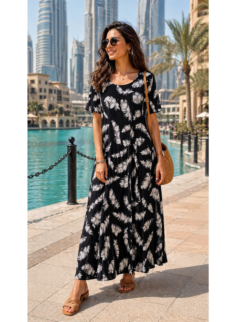 فستان ماكسي نسائي أسود بطبعة ريش وأكمام قصيرة - Image 5