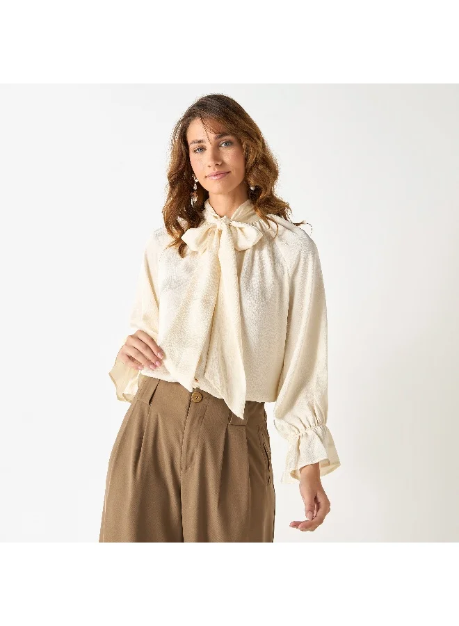 Iconic Iconic Textured Top with Tie-Neck and Flounce Sleeves