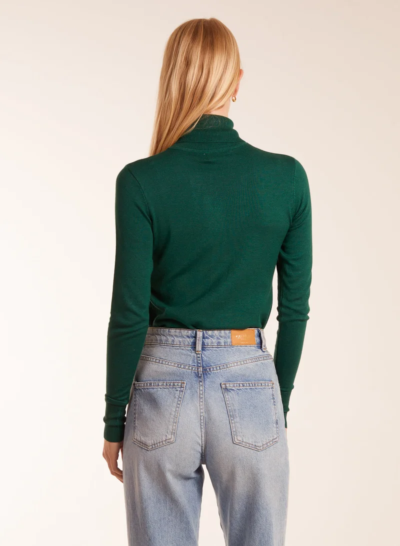 بلو فانيلا كنزة بياقة ملفوفة