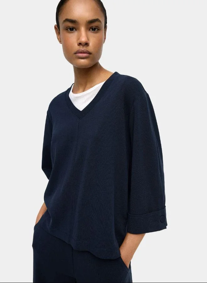 بارفوا الجزء العلوي مع رقبة على شكل حرف V