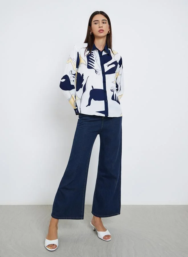 تايك تو بلوزة بقصة عادية وتفاصيل أزرار