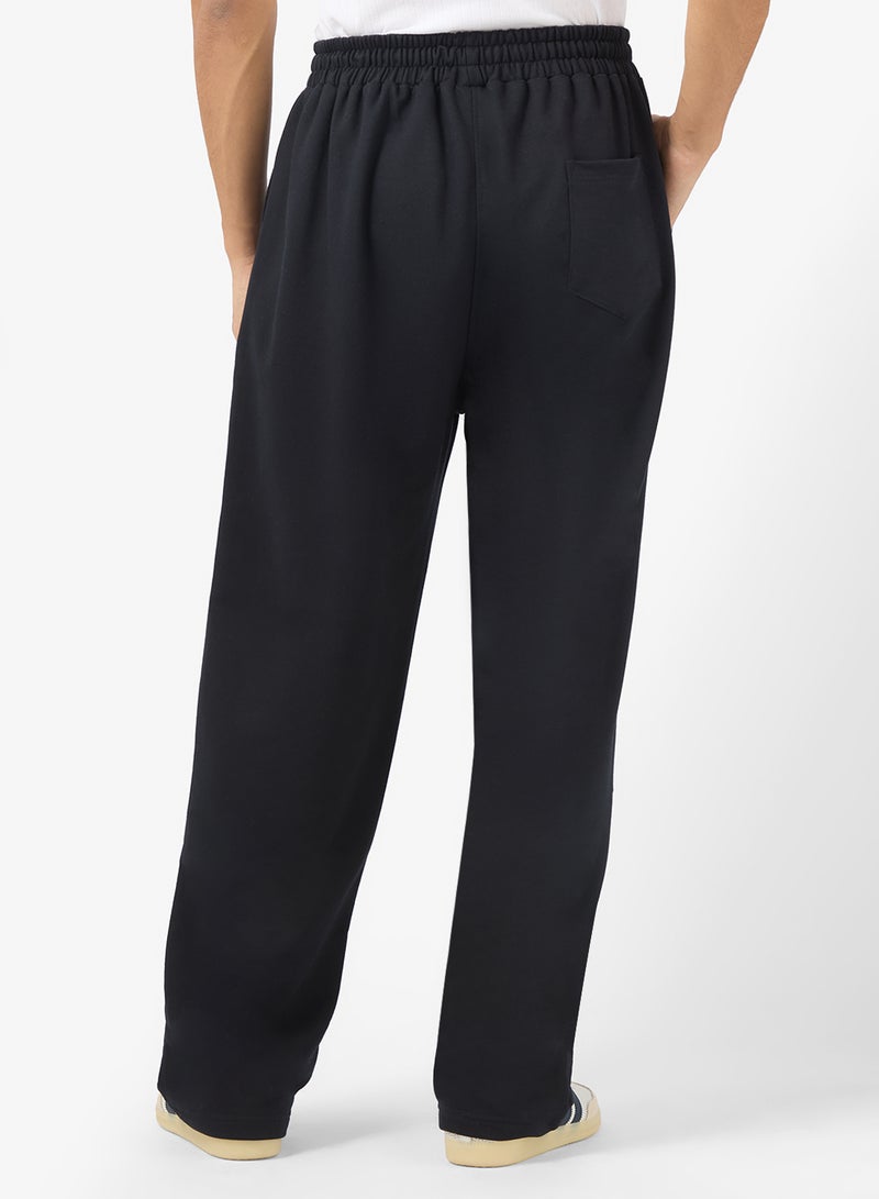 سفنتي فايف بيسيكس بنطلون رياضي بطبعات جرافيك وحافة مفتوحة - Image 3