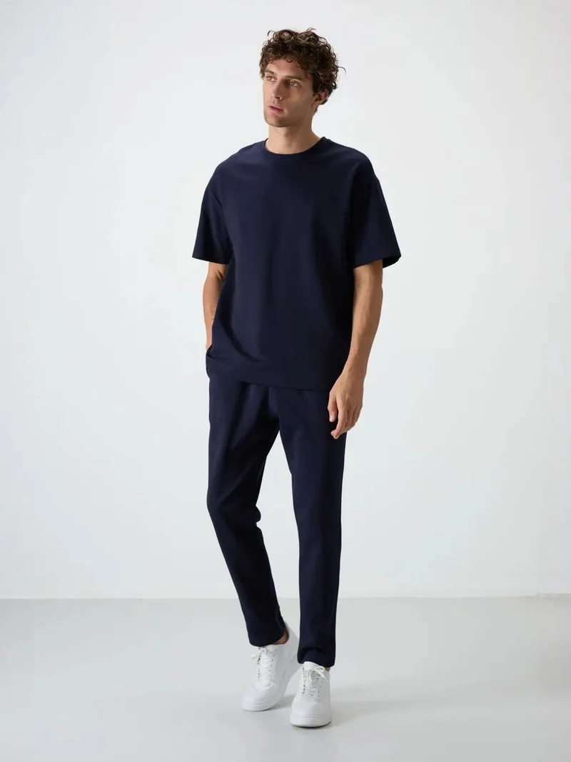 تومي لايف TOMMY Men's Oversized T-shirt And Pants Set