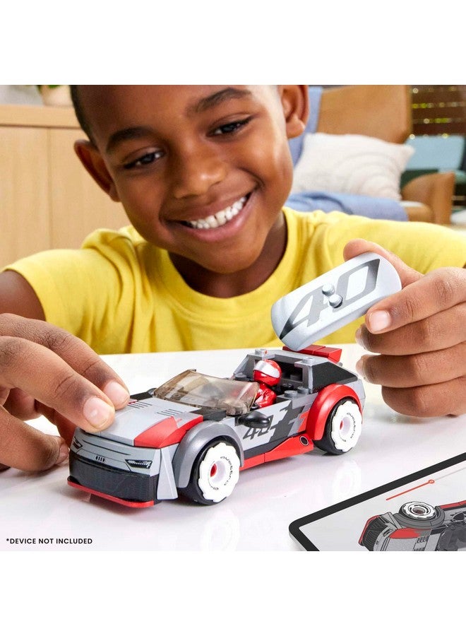 Mega Brands مجموعة ألعاب سباق سيارات هوت ويلز العملاقة، أودي RS 6 GTO كونسبت مع 77 قطعة، 1 شخصية ميكرو أكشن سائق، رمادي، للأطفال من عمر 5 سنوات فما فوق - Image 2