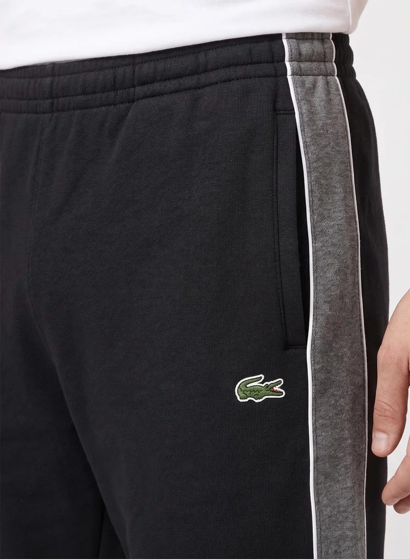 Lacoste  Regular Fit Colorblock Fleece Shorts for Men | Best Price UAE
