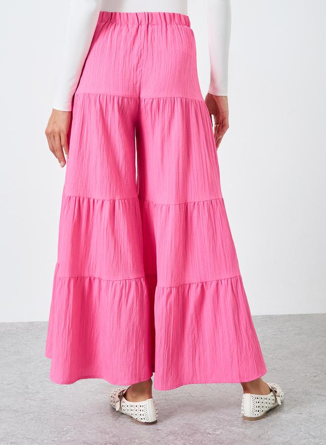 تايك تو بنطال بلازو وردي بطبقات ونقشة بارزة - Image 4