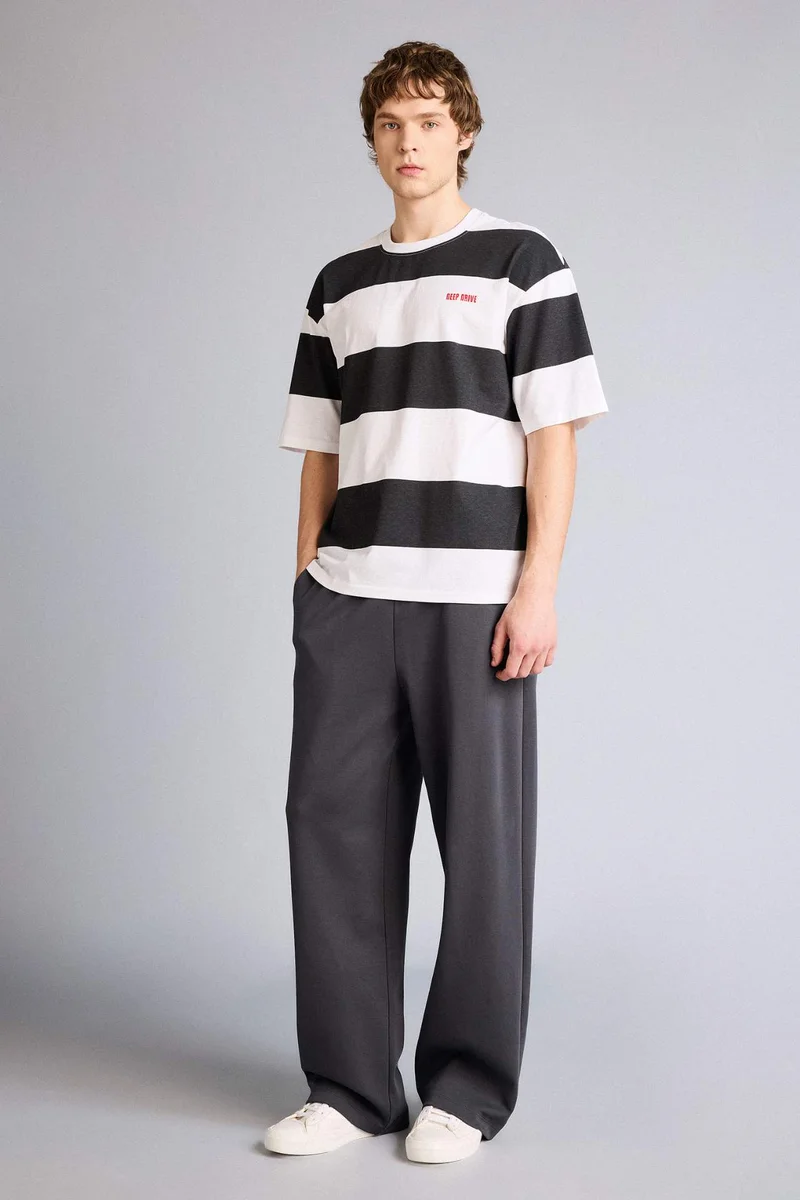 ديفاكتو Baggy Fit Wide Leg Trousers