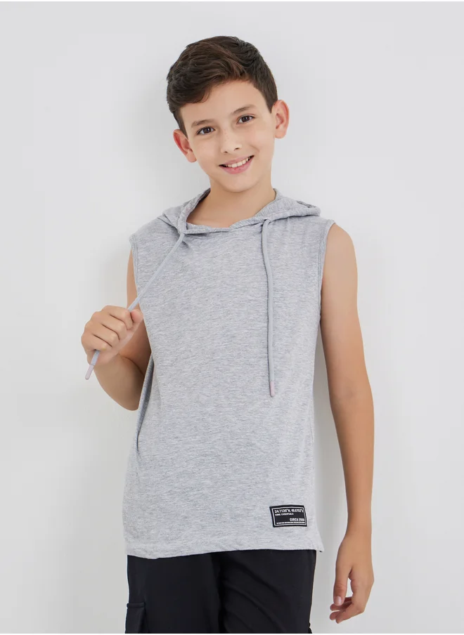 ستايلي Styli Badge Detail Sleeveless Hooded T-Shirt