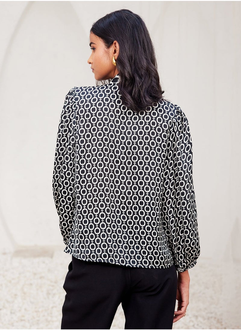 Salt Attire - Trendy Geometric Pattern Top with Stylish Tie-Up Neckline and Full Length Blouson Sleeves Perfect for Chic Everyday Wear and Special Occasions - Image 1