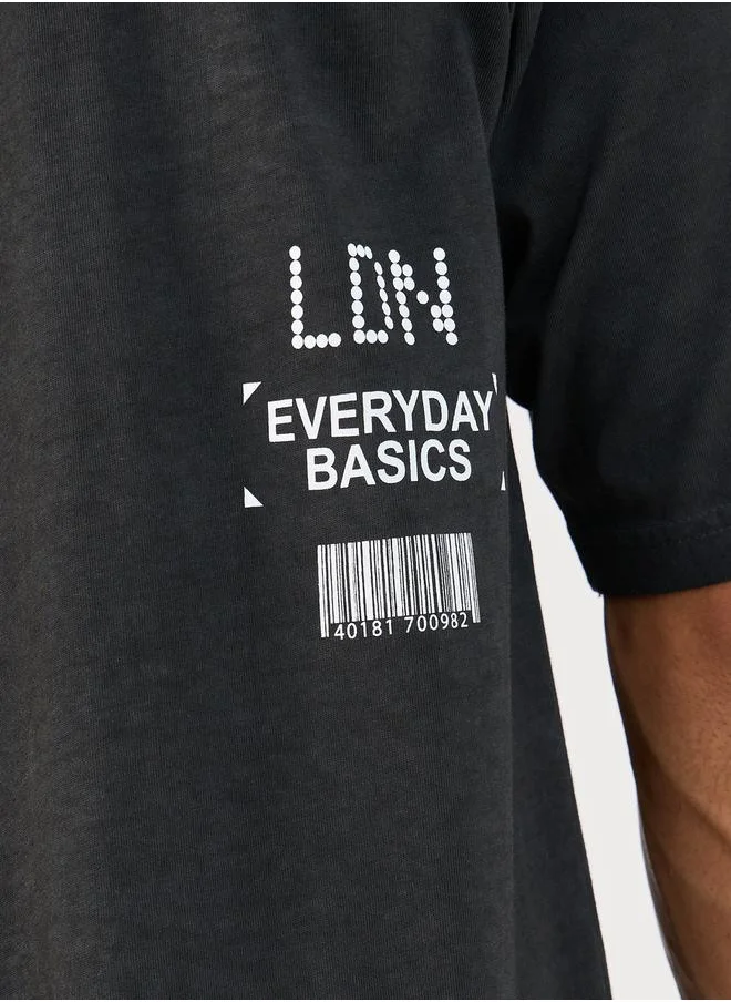 Styli Acid Washed Slogan Print Oversized T-Shirt