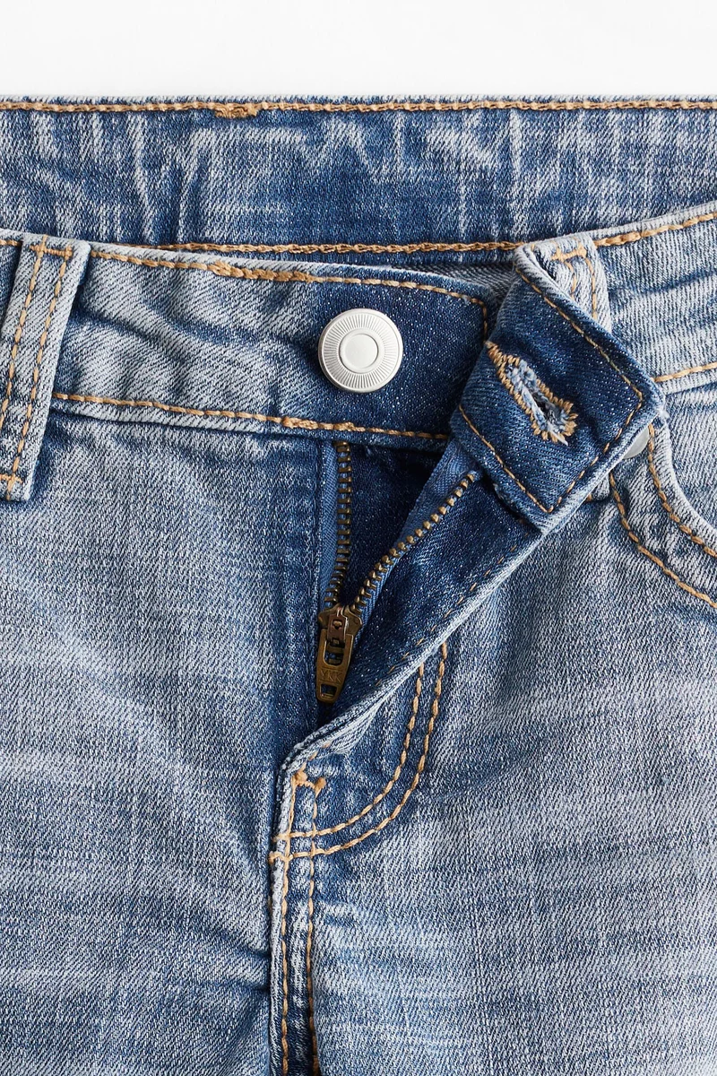 اتش اند ام جينز بحافة واسعة وخصر منخفض