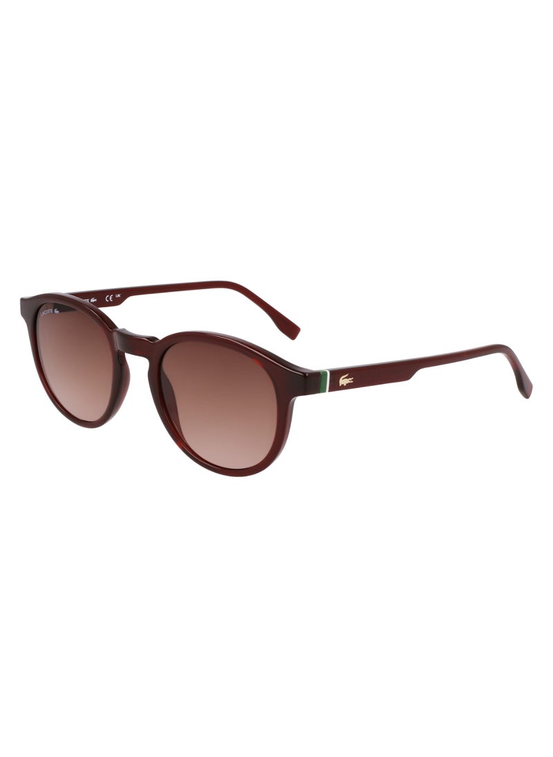 LACOSTE - FULL RIM BIO INJ-G820 ROUND LACOSTE SUNS L6030S  5021 (601) TRANSPARENT BURGUNDY - Image 1
