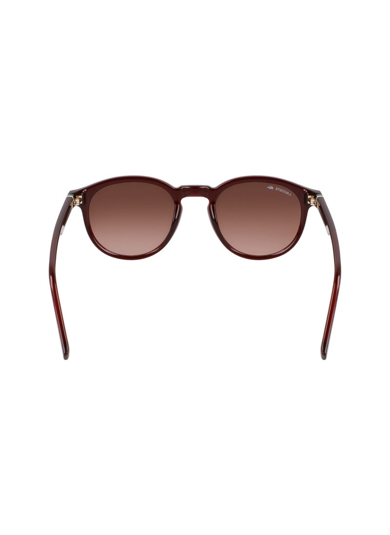 LACOSTE - FULL RIM BIO INJ-G820 ROUND LACOSTE SUNS L6030S  5021 (601) TRANSPARENT BURGUNDY - Image 1